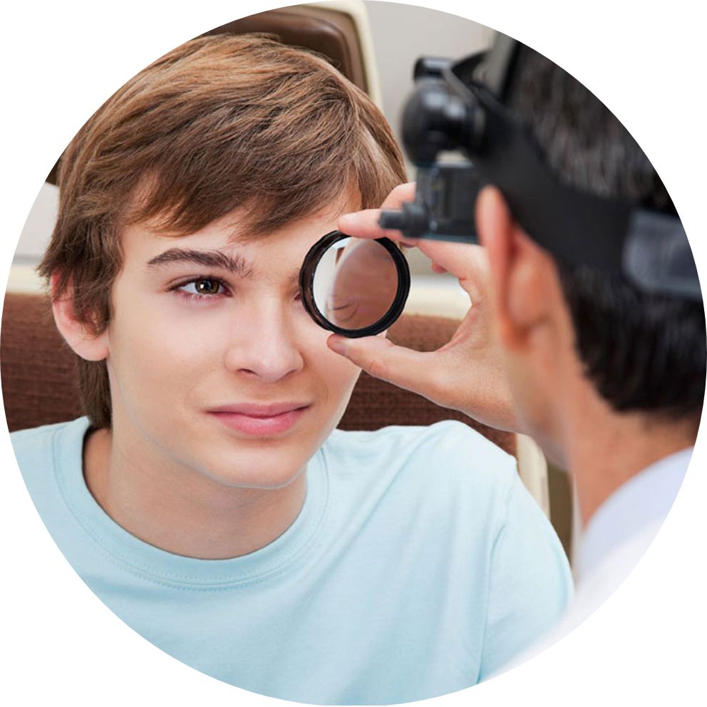 Teen receiving an eye exam