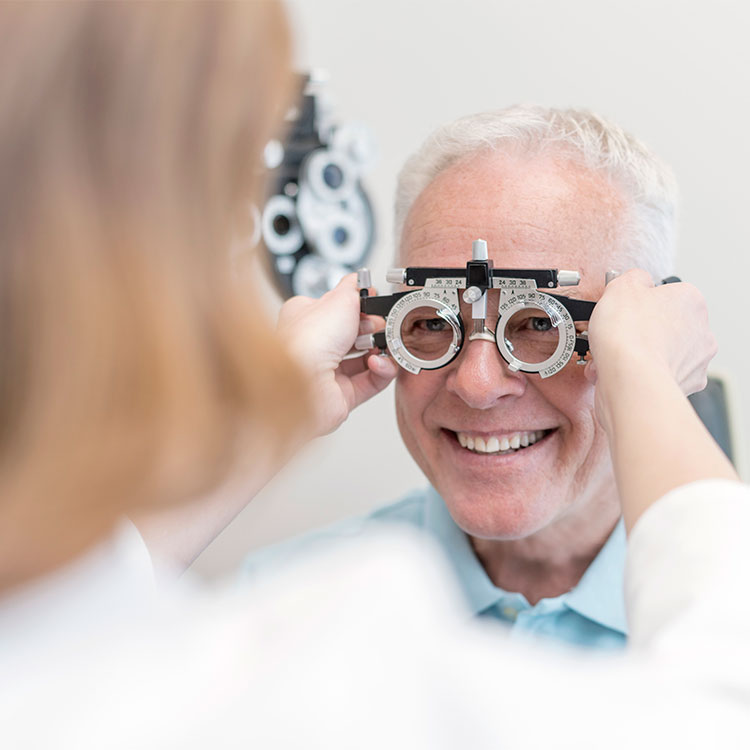 Older man receiving an eye exam